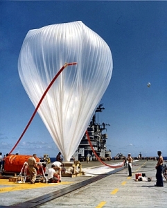Inflating a Skyhook balloon in the deck of the USS Valley Forge