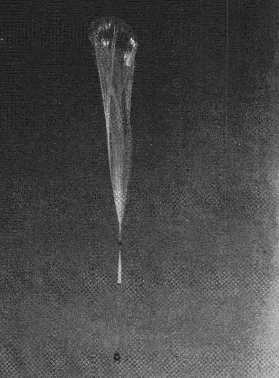 The gondola, parachute and balloon immediately following its release.