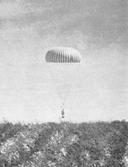 The telescope, returning to the ground under its parachute. A rare image taken at the end of Flight C