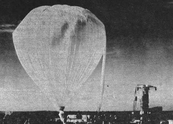 Technicians inflate giant balloon prior to launch-<br>ing at Palestine, Texas. 3-ton, 3-story tall telescope studied Jupiter