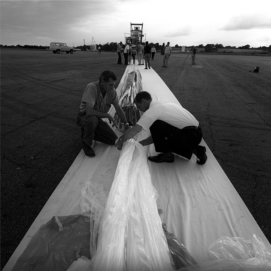 The purpose of the flight was to measure ultraviolet radiation from the Moon at different wavelengths. Here team members lay the balloon out on the ground before it is filled with helium. (copyright University Corporation for Atmospheric Research)