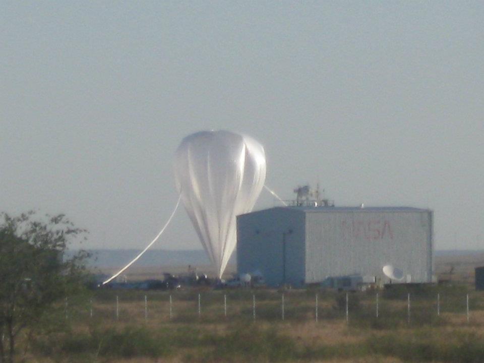 Distant view of the balloon almost fully inflated. In the foreground the NASA highbay building in Fort Sumner (Picture: Ross hays)